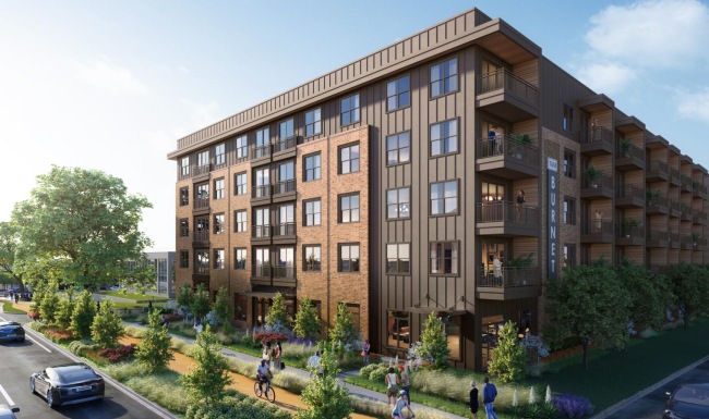 a building with a street and cars