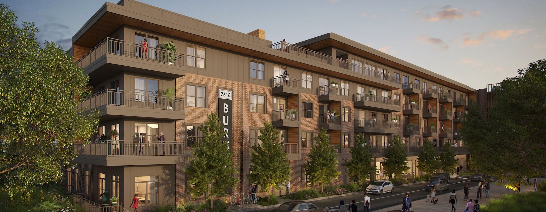 a building with a street and cars