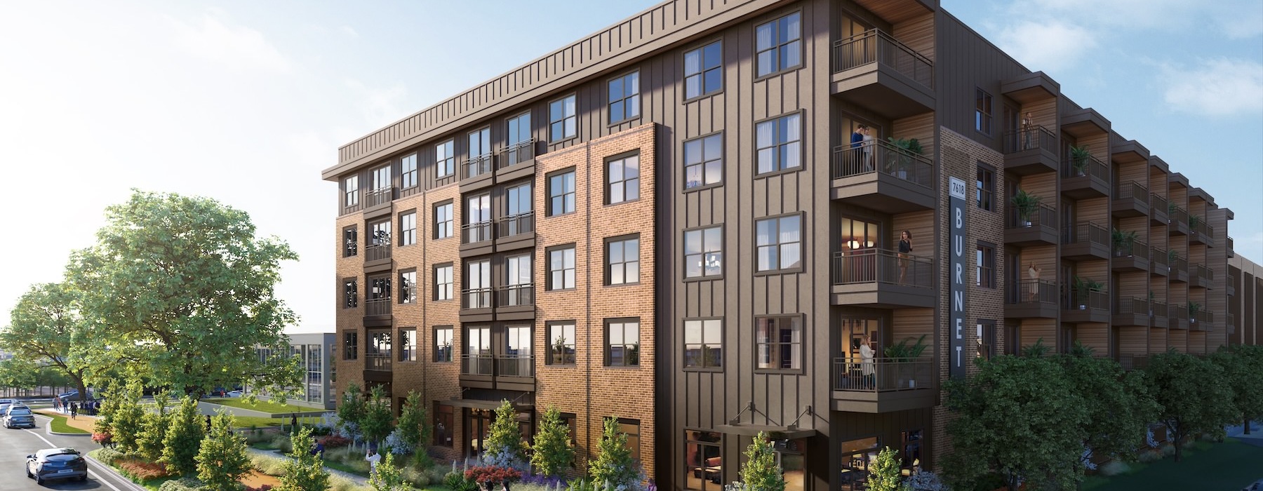 a building with a street and cars