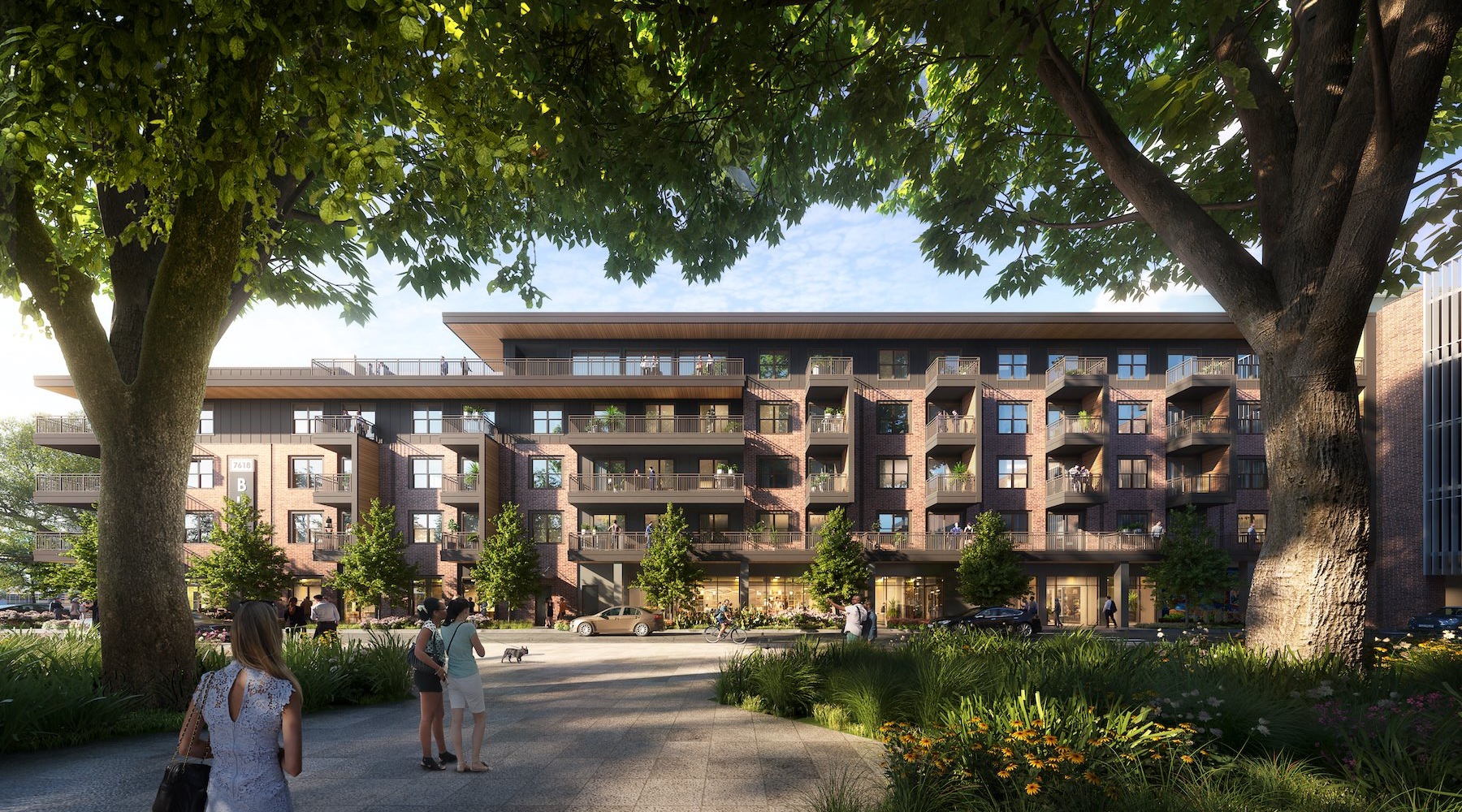 a group of people walking outside of a building