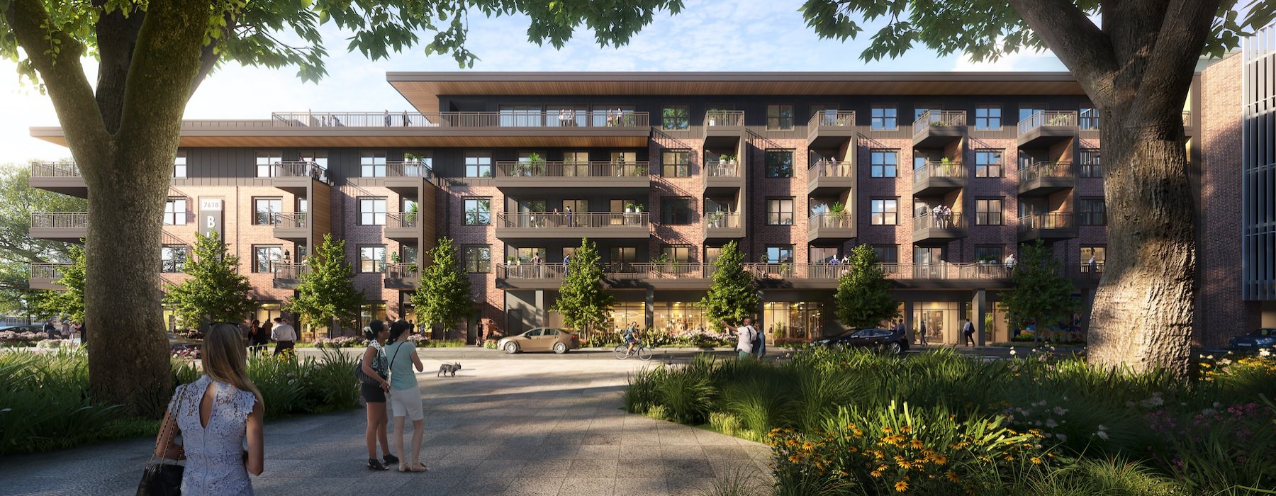 a group of people walking outside of a building