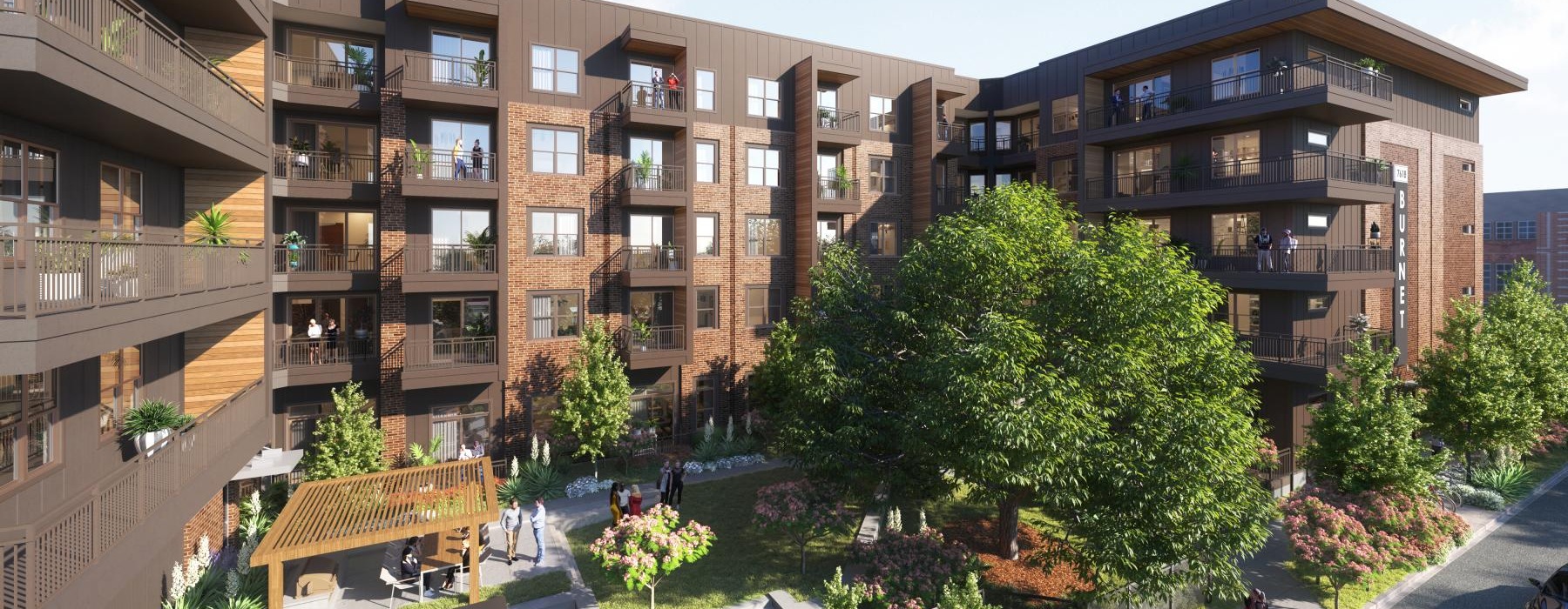 a street with trees and buildings on either side of it