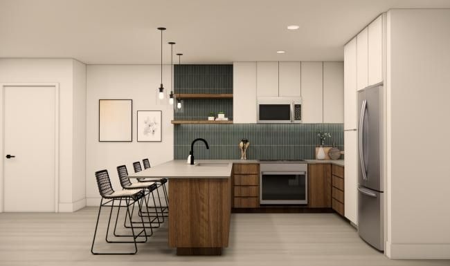 a kitchen with a table and chairs