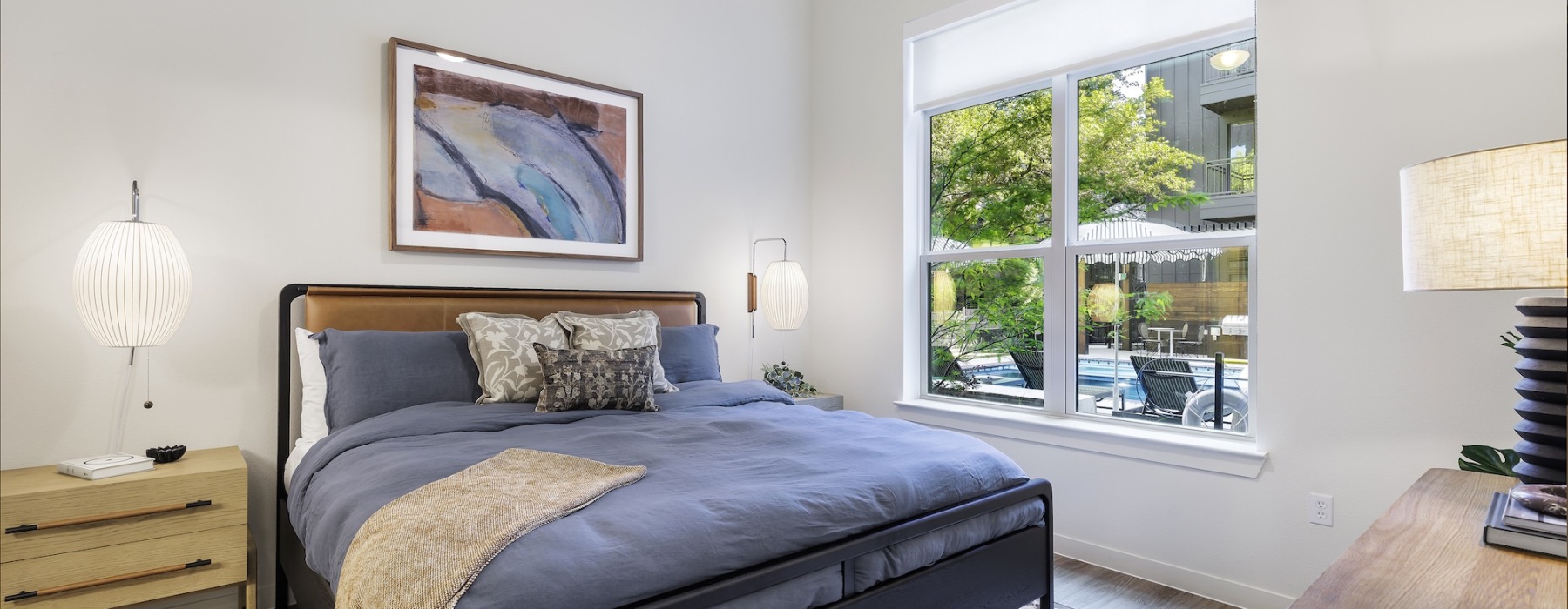Bedroom with natural lighting and high ceilings