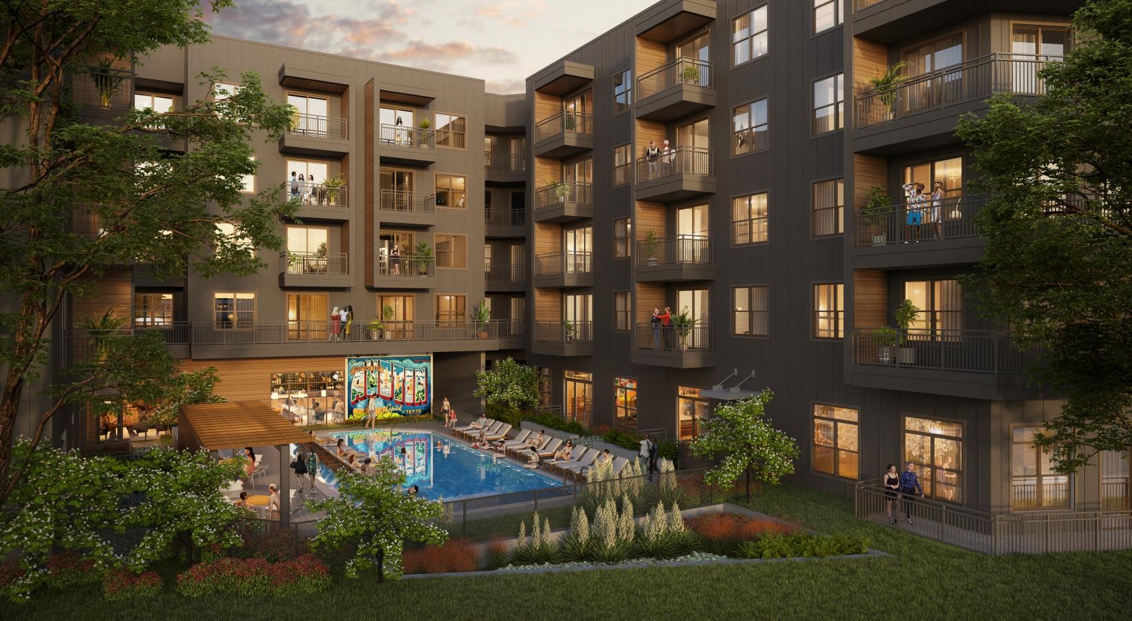 a large building with a pool in front of it